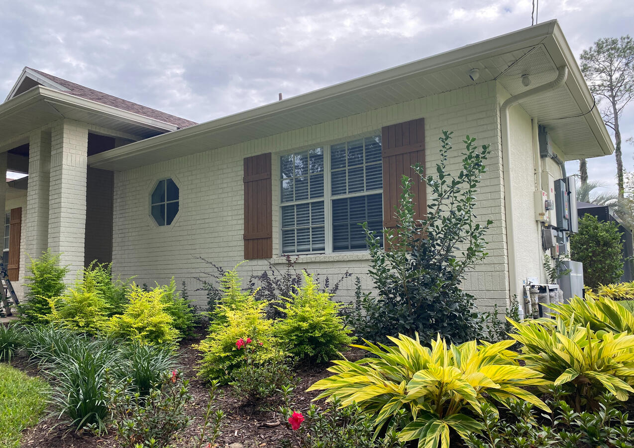New Gutters and Downspouts
